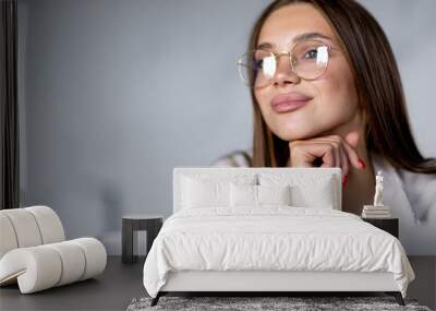 Young woman working on laptop at home in the morning Wall mural